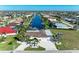 Aerial view of a waterfront home with direct access to the canal and beautiful landscaping at 740 Via Esplanade, Punta Gorda, FL 33950