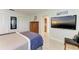 Bedroom featuring neutral walls, white trim and an en-suite bathroom at 740 Via Esplanade, Punta Gorda, FL 33950