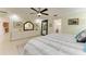 Spacious main bedroom boasts tiled floors, neutral color palettes, and ample natural light at 740 Via Esplanade, Punta Gorda, FL 33950
