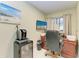 Well-appointed office with custom desk, beverage center and large window at 740 Via Esplanade, Punta Gorda, FL 33950