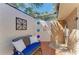 Outdoor shower featuring privacy wall and built-in bench at 740 Via Esplanade, Punta Gorda, FL 33950