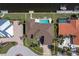 Overhead aerial view of property on a landscaped lot with boat dock at 8 Ocean Dr, Punta Gorda, FL 33950