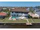 Aerial view of property outlined on a landscaped lot with water frontage at 8 Ocean Dr, Punta Gorda, FL 33950