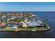 Aerial view of property outlined with waterfront and neighboring homes on a clear day at 8 Ocean Dr, Punta Gorda, FL 33950