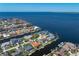 Aerial view of the neighborhood with many waterfront properties and boat access at 8 Ocean Dr, Punta Gorda, FL 33950