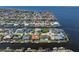 Waterfront property featuring a private dock, pool, and beautiful canal views in a residential neighborhood at 8 Ocean Dr, Punta Gorda, FL 33950