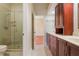 Bathroom with a glass shower and view to the vanity at 8 Ocean Dr, Punta Gorda, FL 33950