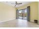 Light-filled bedroom with a sliding glass door that opens to beautiful views of the canal at 8 Ocean Dr, Punta Gorda, FL 33950