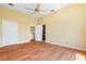 Spacious bedroom featuring hardwood floors and a ceiling fan at 8 Ocean Dr, Punta Gorda, FL 33950