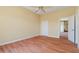 Bedroom featuring hardwood floors and a ceiling fan at 8 Ocean Dr, Punta Gorda, FL 33950