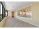 Bonus room with etched glass window and tile flooring at 8 Ocean Dr, Punta Gorda, FL 33950