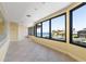 The room features large windows, tile flooring, and a water view at 8 Ocean Dr, Punta Gorda, FL 33950