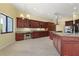 Elegant kitchen with custom cabinetry, stainless steel appliances, and a built-in desk area at 8 Ocean Dr, Punta Gorda, FL 33950