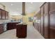 Gourmet kitchen with stainless steel appliances, custom cabinetry, and spacious island at 8 Ocean Dr, Punta Gorda, FL 33950