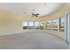 Bright living room featuring lots of large windows overlooking the canal and waterfront at 8 Ocean Dr, Punta Gorda, FL 33950