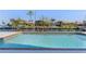 Waterfront pool with a depth marker and neighborhood water views on a clear day at 8 Ocean Dr, Punta Gorda, FL 33950