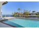 Waterfront pool with a depth marker showing water views on a clear day at 8 Ocean Dr, Punta Gorda, FL 33950