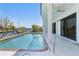 Backyard pool with views of the canal, docks and boats at 8 Ocean Dr, Punta Gorda, FL 33950