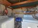 Laundry setup with a new washer and dryer included with the sale at 858 Conreid Ne Dr, Port Charlotte, FL 33952