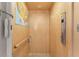 Inside an elevator with a wooden interior and an elevator panel at 10300 Tarpon Landings Ter # 4, Placida, FL 33946