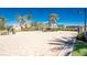 A well-maintained entrance welcomes residents and visitors with pristine landscaping and secure access at 10300 Tarpon Landings Ter # 4, Placida, FL 33946