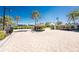 Welcoming entrance with pavers and lush landscaping provides a grand entrance to the community at 10300 Tarpon Landings Ter # 4, Placida, FL 33946