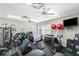 Bright community gym featuring multiple exercise machines and equipment for a full workout at 10300 Tarpon Landings Ter # 4, Placida, FL 33946