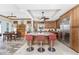 Open kitchen with a large island, ample cabinet space, and stainless steel appliances at 10300 Tarpon Landings Ter # 4, Placida, FL 33946