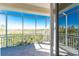 Enjoy the outdoor views from this spacious lanai with screening and tiled flooring at 10300 Tarpon Landings Ter # 4, Placida, FL 33946