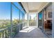 Relaxing lanai with a beautiful outdoor view, screening and access to the main bedroom at 10300 Tarpon Landings Ter # 4, Placida, FL 33946