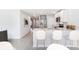 Modern kitchen with stainless steel appliances, a breakfast bar, and open access to other areas at 12149 Karney Ave, Port Charlotte, FL 33981