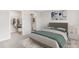 Cozy main bedroom featuring carpet floors and a walk-in closet at 12149 Karney Ave, Port Charlotte, FL 33981