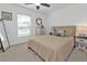 Bright bedroom with neutral colors, window and decorative accents at 1353 Newton St, Port Charlotte, FL 33952