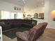 Open concept living room with tile floors, ample seating, and high ceilings at 1500 Westover St, Port Charlotte, FL 33953