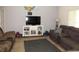 Relaxing living room with cozy seating, entertainment center, and welcoming atmosphere at 1500 Westover St, Port Charlotte, FL 33953