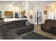Open-concept living room featuring a casual dining area and access to the kitchen at 1500 Westover St, Port Charlotte, FL 33953