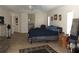 Large main bedroom with king bed, tile flooring, en-suite bathroom, and multiple windows at 1500 Westover St, Port Charlotte, FL 33953