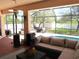 Outdoor patio with comfortable seating, grilling area, and view of the swimming pool and backyard at 1500 Westover St, Port Charlotte, FL 33953