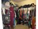 Walk-in closet is packed with clothes, shoes, and accessories, providing ample storage solutions at 1500 Westover St, Port Charlotte, FL 33953