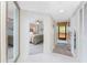 Inviting hallway leading to a bedroom and outdoor patio at 1601 Park Beach Cir # 114/4, Punta Gorda, FL 33950