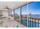 The lanai offers comfortable seating and stunning water views of the pool and the bay for relaxing at 1601 Park Beach Cir # 114/4, Punta Gorda, FL 33950