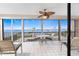 Breathtaking lanai featuring a table with chairs with scenic bay views, perfect for relaxing and enjoying sunsets at 1601 Park Beach Cir # 114/4, Punta Gorda, FL 33950