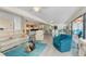 Open living room featuring contemporary furnishings and plenty of natural light at 1601 Park Beach Cir # 114/4, Punta Gorda, FL 33950