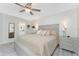 Serene main bedroom showcases a large bed, neutral tones, and an en-suite bathroom at 1601 Park Beach Cir # 114/4, Punta Gorda, FL 33950