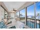 Large patio with views of the in-ground pool and waterfront at 1601 Park Beach Cir # 114/4, Punta Gorda, FL 33950
