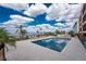 Enjoy the lovely community pool with lounge chairs and beautiful water views for relaxing and entertaining at 1601 Park Beach Cir # 114/4, Punta Gorda, FL 33950