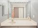 Bathroom featuring a large mirror, vanity, and a neutral color palette at 175 Kings Hwy # 717, Punta Gorda, FL 33983