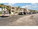 Well-maintained condo parking lot with ample parking and lush landscaping at 175 Kings Hwy # 717, Punta Gorda, FL 33983