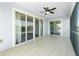Relax and enjoy the outdoors on this screened balcony with tile flooring and ceiling fan at 2001 Bal Harbor Blvd # 2202, Punta Gorda, FL 33950