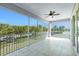 Enjoy the view from this spacious screened balcony with tile floors and a ceiling fan at 2001 Bal Harbor Blvd # 2202, Punta Gorda, FL 33950